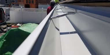 Clean gutter system after maintenance and debris removal