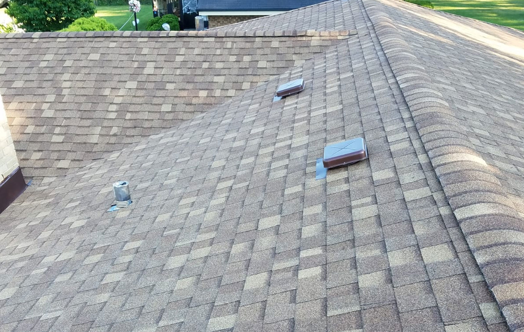 Freshly mowed residential front yard in Cleveland, Ohio after professional lawn care service